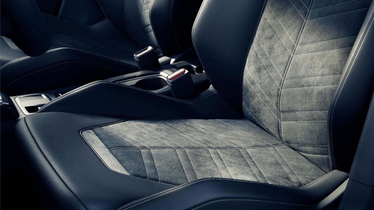 Primer plano del asiento estampado negro del Opel Corsa Electric